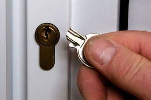 A smashed key next to a door lock