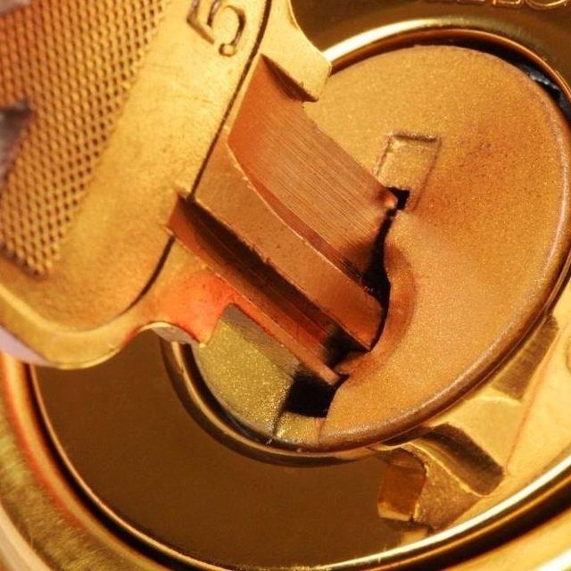 A key entering a lock